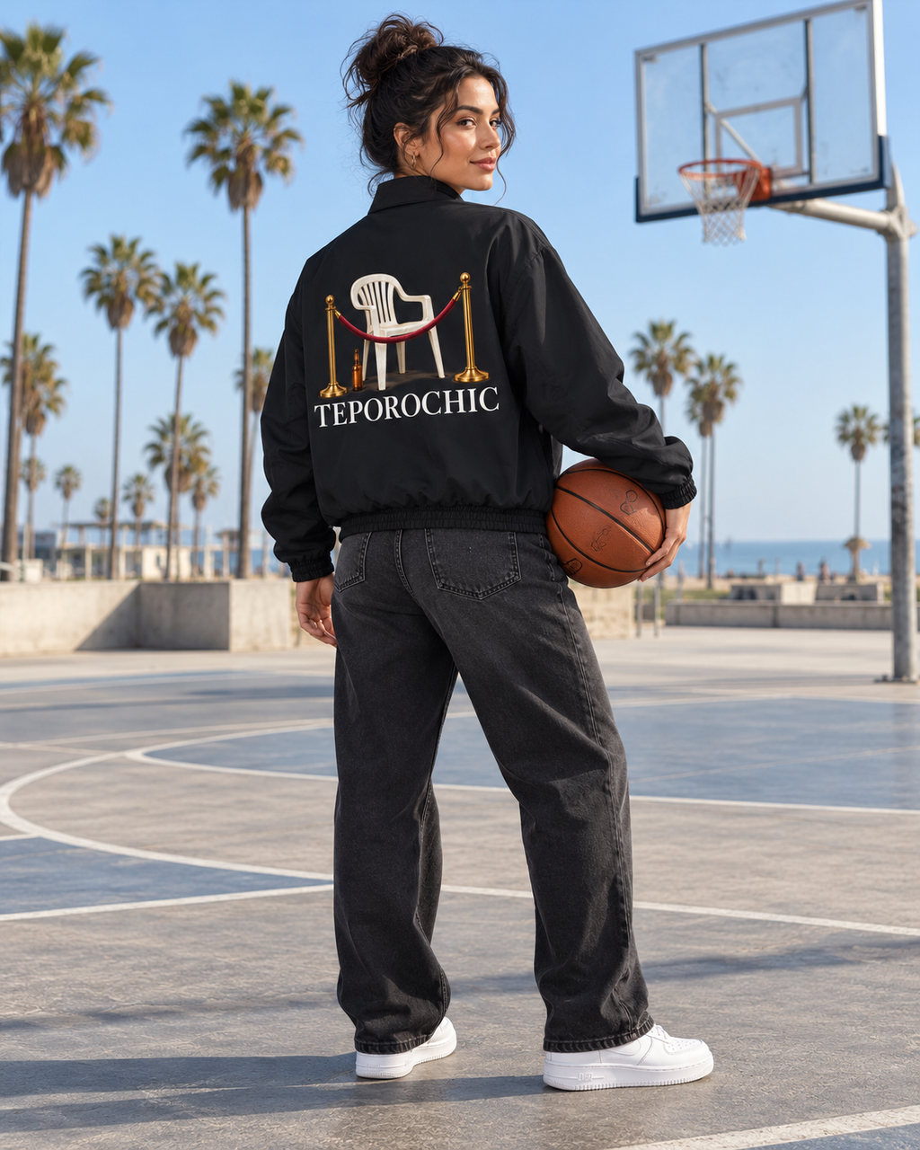 Nacoture model wearing Teporochic Bomber Jacket [Color: Black] [Model: Women]