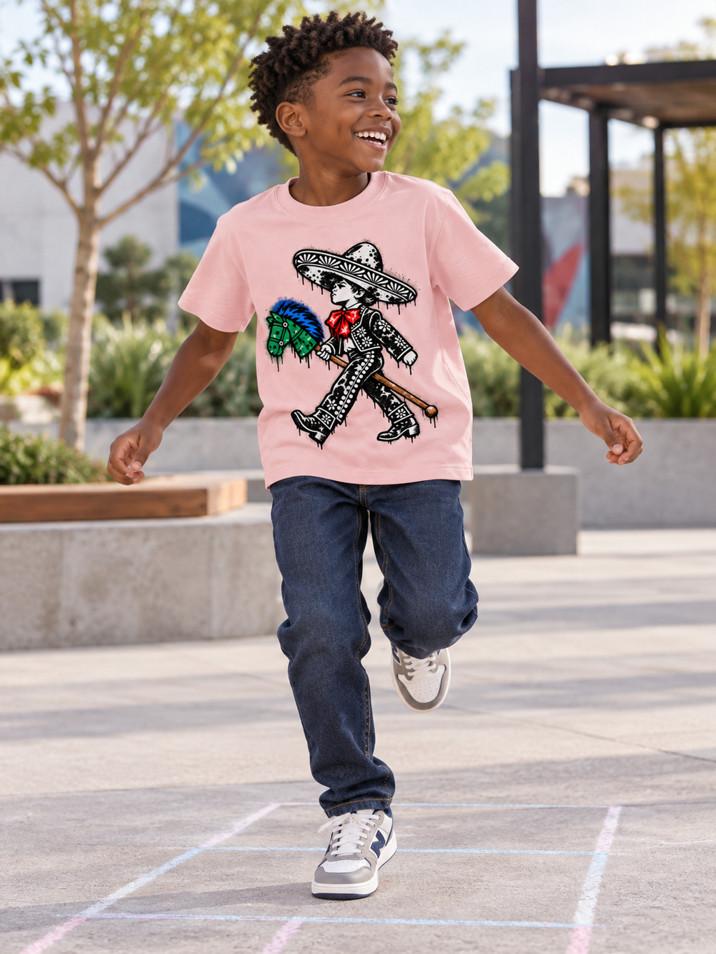 Child wearing Charrito hobby-horse tee [Color: Pink]